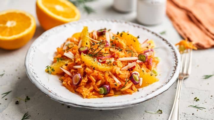 Carrot salad with apple and orange